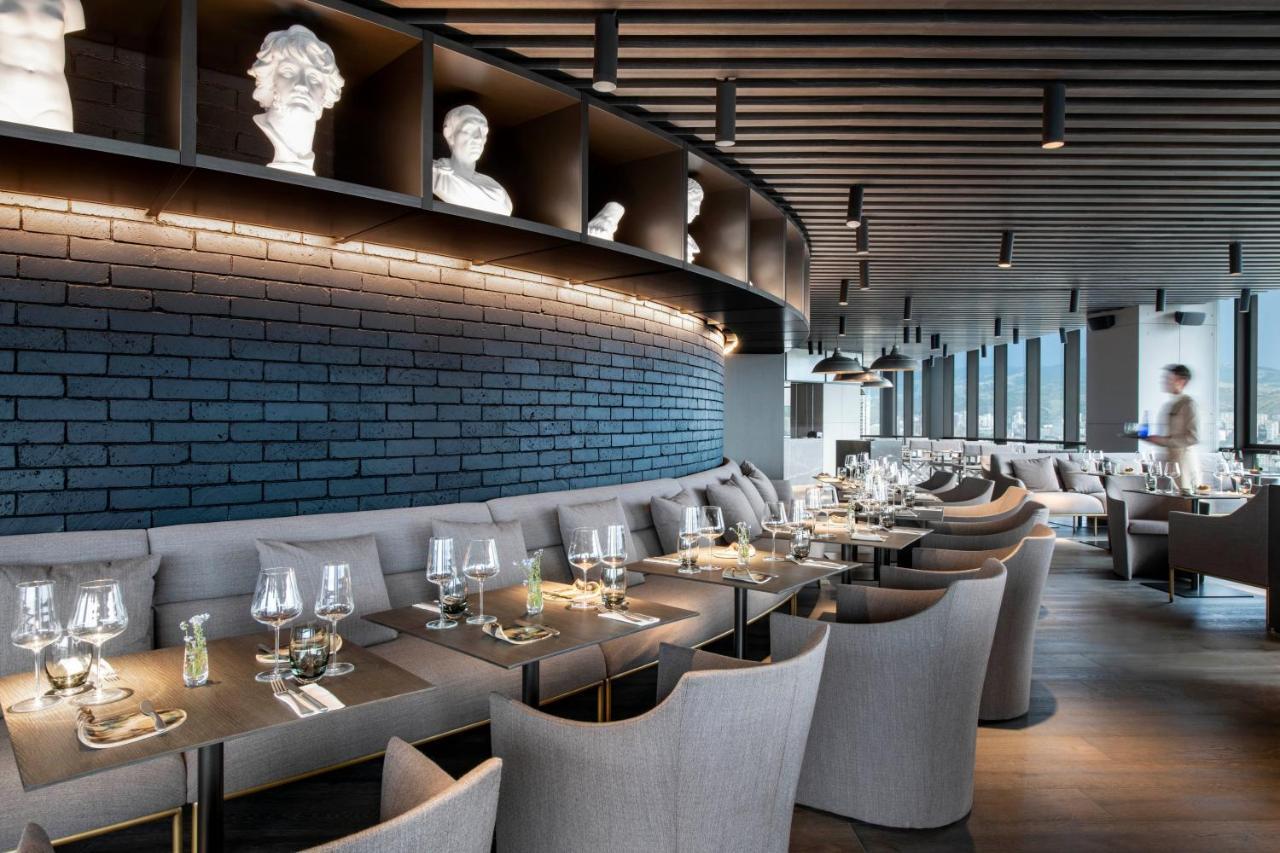 Pullman Tbilisi Axis Towers Hotel Exterior photo Restaurant 101