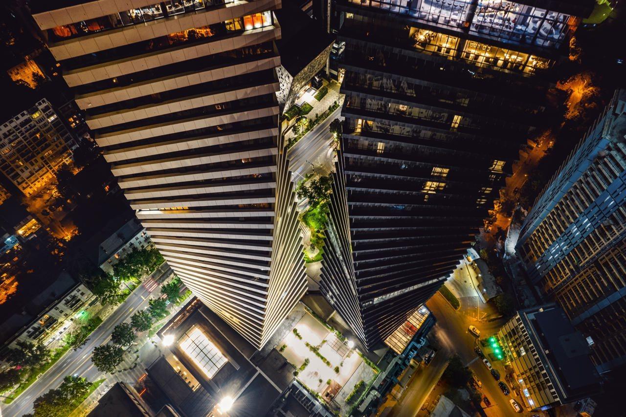 Pullman Tbilisi Axis Towers Hotel Exterior photo Aerial view of the building at night