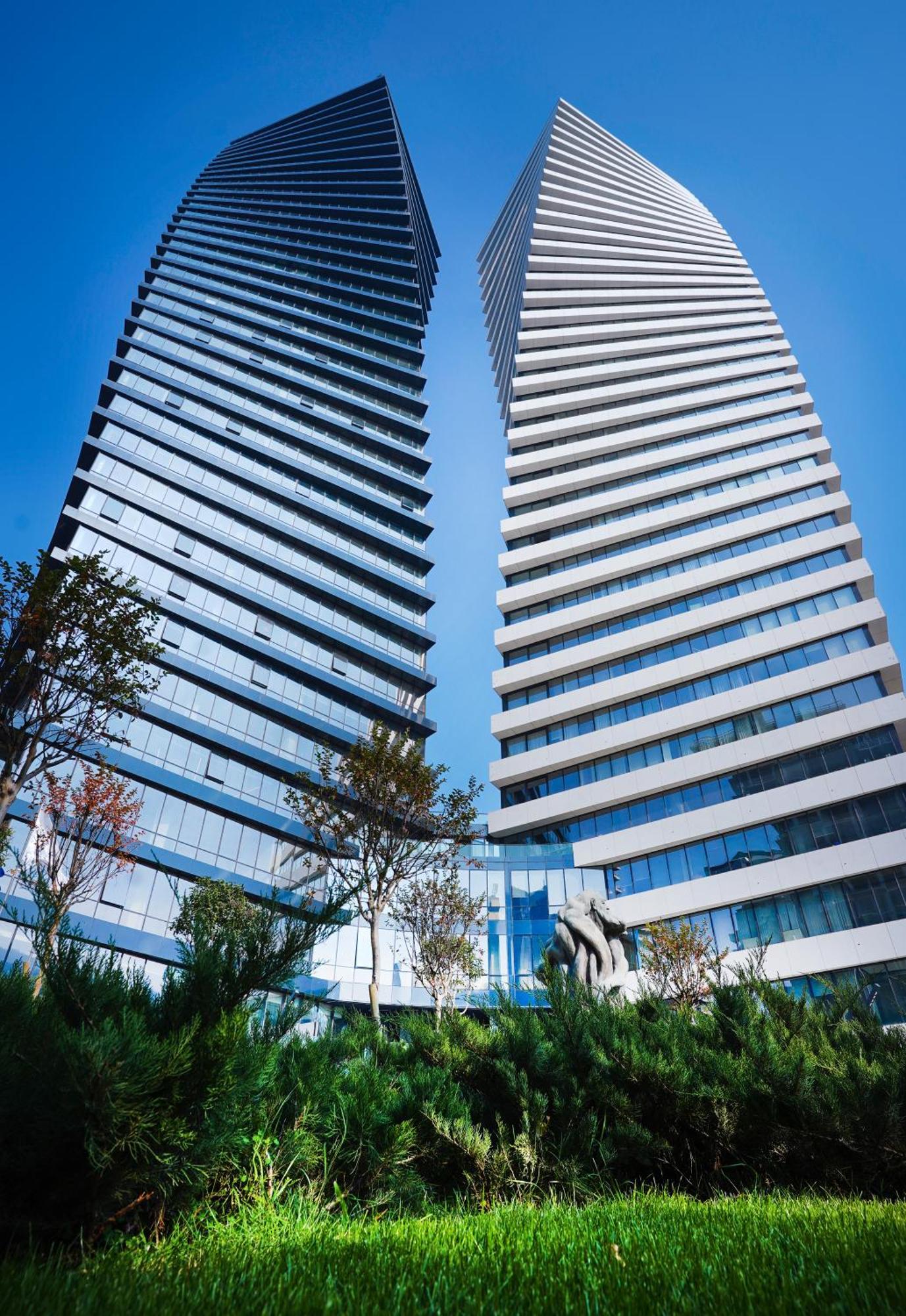 Pullman Tbilisi Axis Towers Hotel Exterior photo The 2014-completed headquarters of the company in Beijing